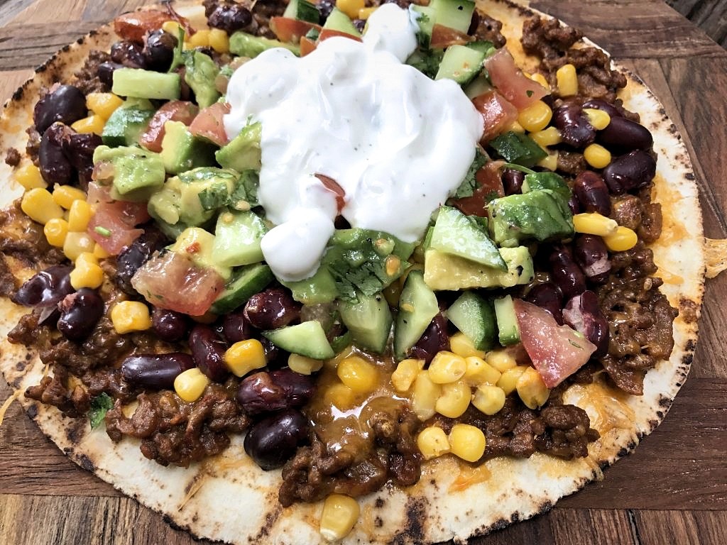 Wat eet je in Mexico, deze tostado bijvoorbeeld.
