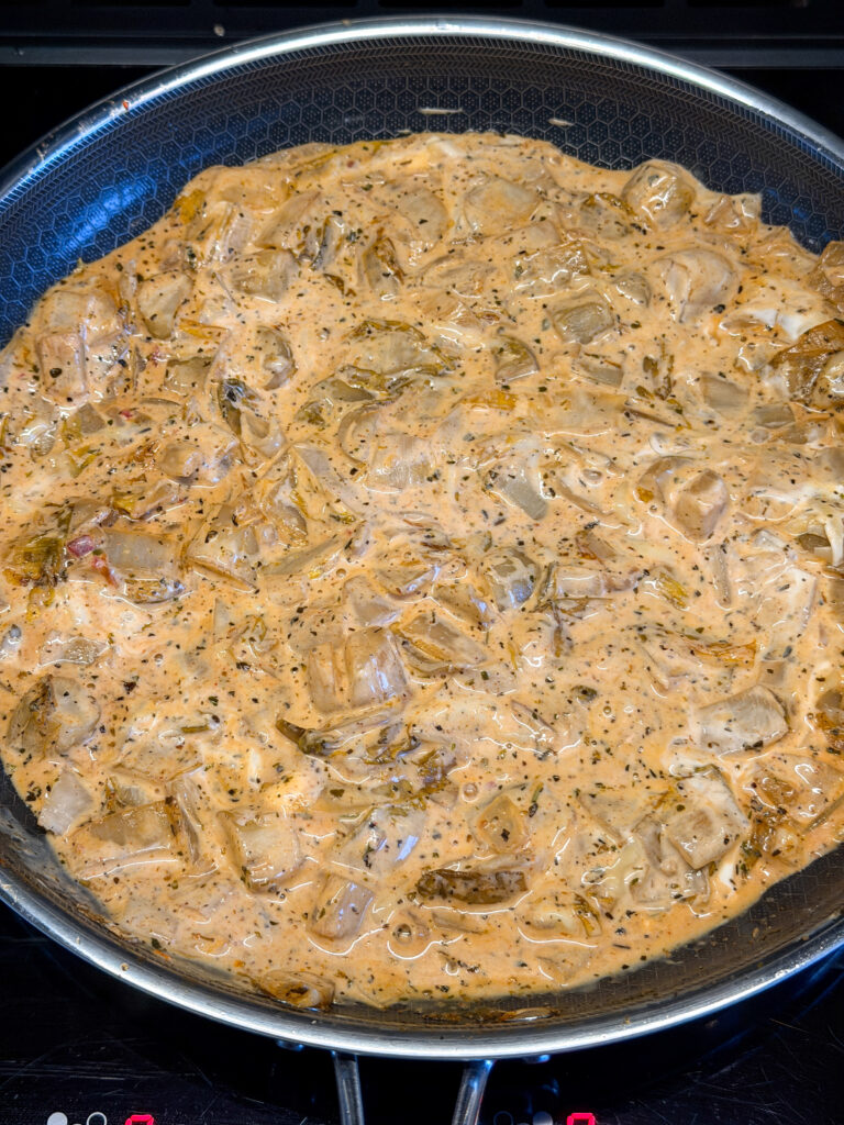 Stap 4 witlofstamppot romige witlofsaus in pan