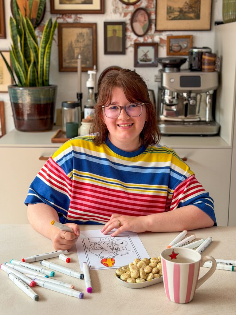 Beaudine kleurt aan de eet tafel